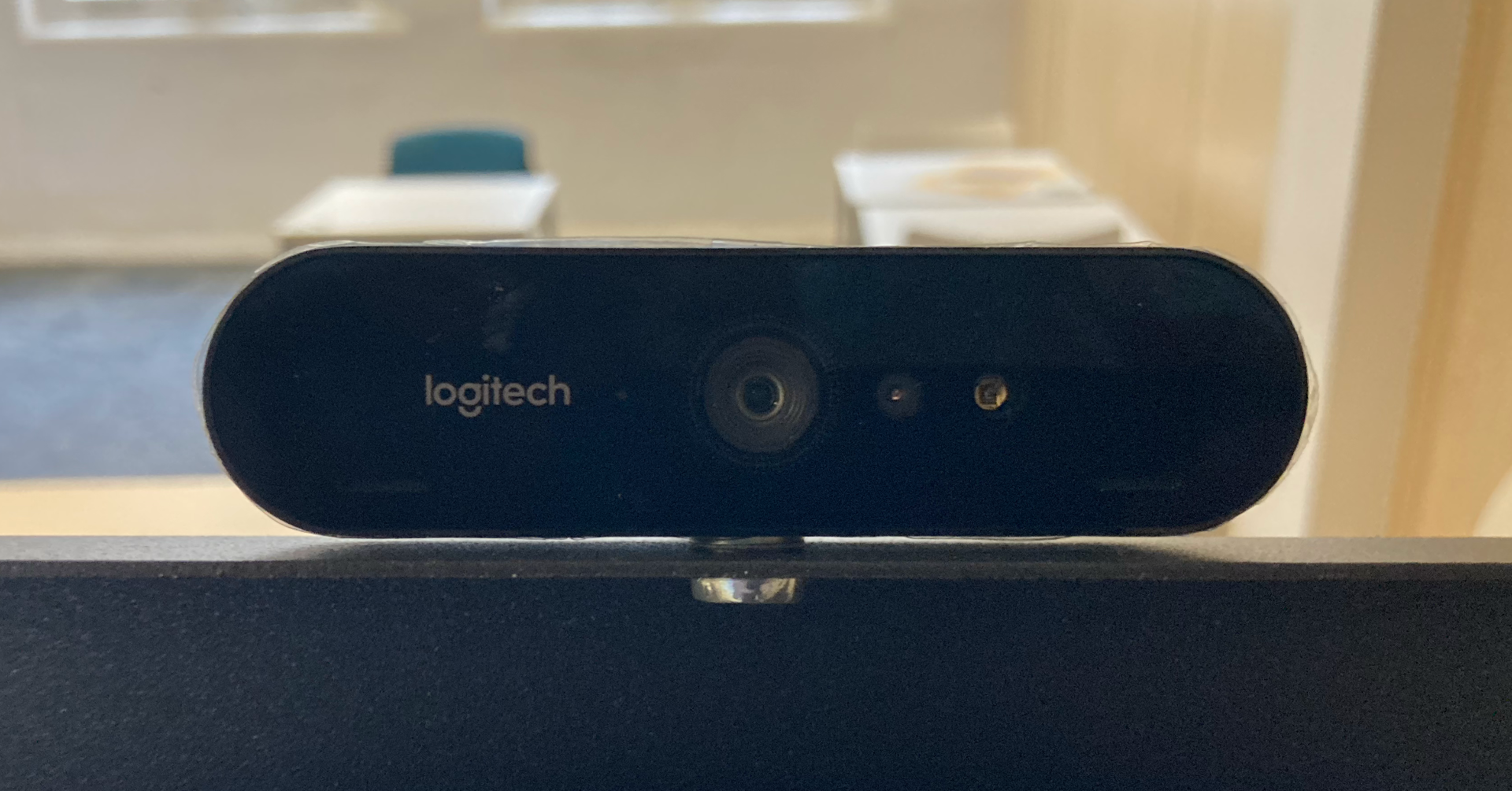 Logitech Brio webcam mounted on a monitor
