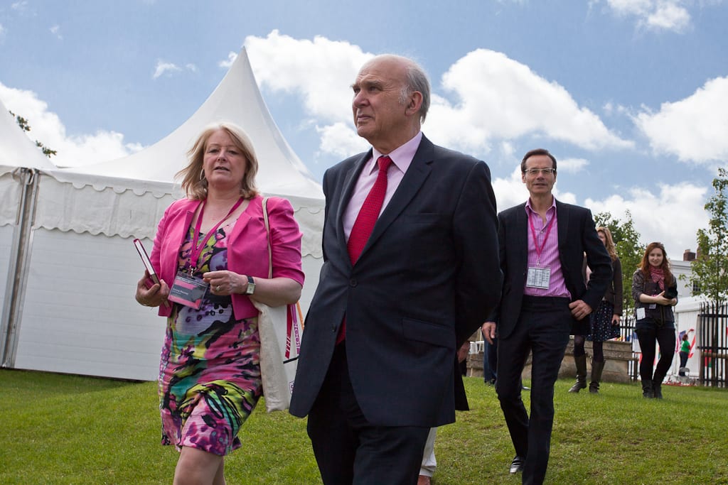 Vince Cable walking