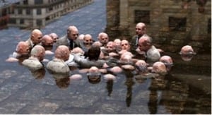A sculpture by Spanish street artist Isaac Cordal dubbed ‘Politicians discussing global warming’ by social media.