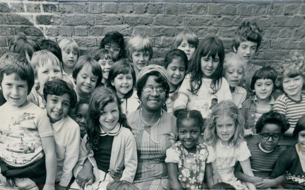 Beryl Gilroy with her pupils; she was given an honorary fellowship in 2000