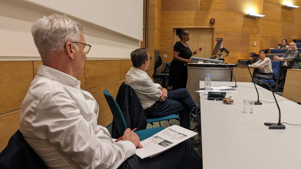 Professors Martin Knapp and Tim Kendall listen to Dr Lade Smith's contribution to the discussion on funding mental health