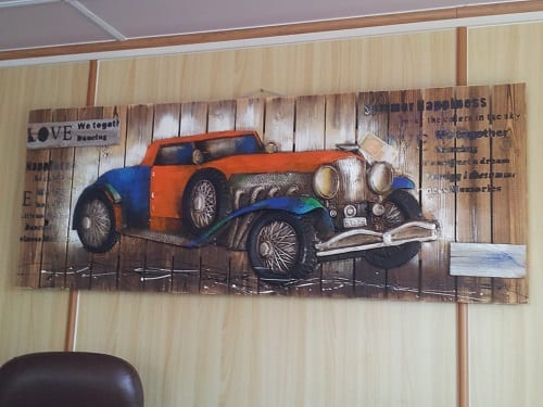 Image 7. Painting of car with money.