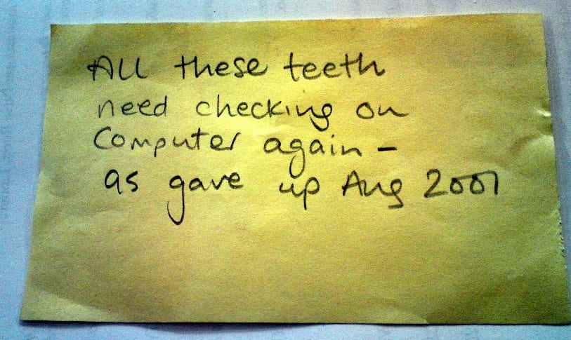 post it note from the Grant Museum that reads All these teeth need checking on computer again- as gave up Aug 2001