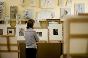A student views works on display at UCL Art Collections