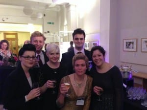 members of the UCL Art Museum team raise a glass of bubbly