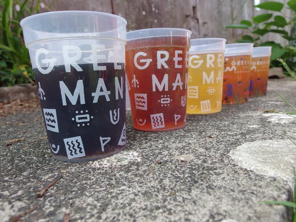 several beers lines up in green man festival branded glasses