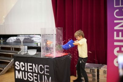 Visitor participating in the interactive Science Museum show.