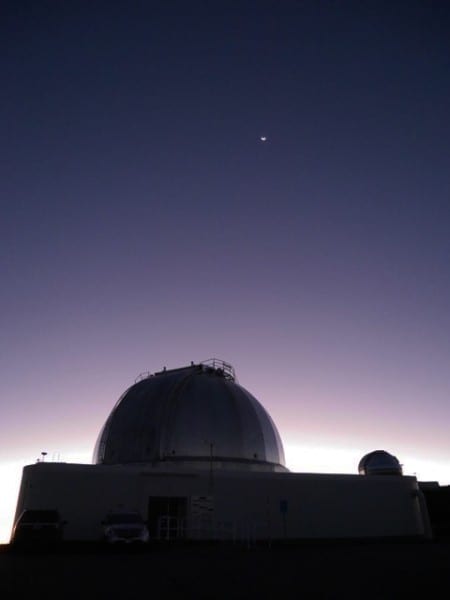 The telescope at dawn, with crescent moon. Photo: Patrick Owen