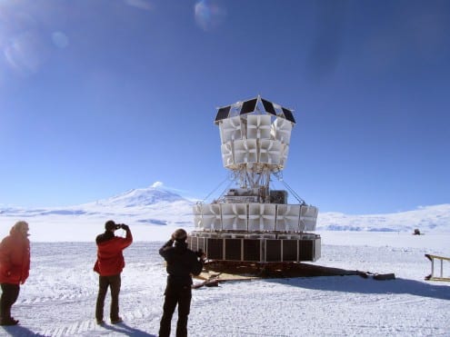 ANITA prior to being attached to the balloon. In the background, Mount Erberus, the second-highest volcano in Antarctica