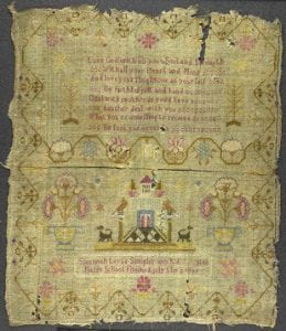 A Sampler with decorative elements