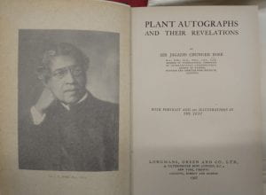 The title pages of Jagadish Chandra Bose's Plant Autographs and Their Revelations (1927). The left hand page features a black and white portrait photograph of Bose
