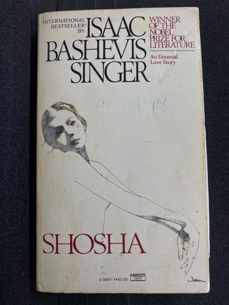 The title page of Shosha by Isaac Bashevis Singer. There is an image of a woman, and a faint pen annotation that says 'Miss Joyce'.