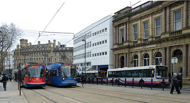 Image of trams and bus