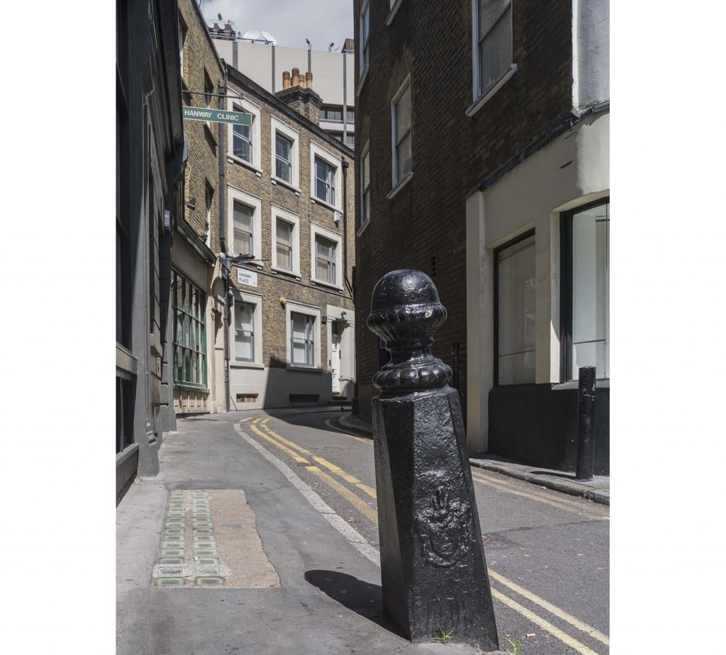 Hanway Street and the Marylebone boundary bollard at the junction with Hanway Place (© Historic England, Chris Redgrave)