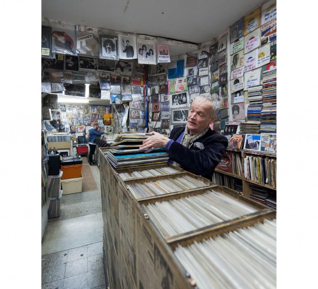 Tim Derbyshire, the owner of the 'On The Beat' Record Shop at 22 Hanway Street in 2014 (© Historic England, Chris Redgrave)