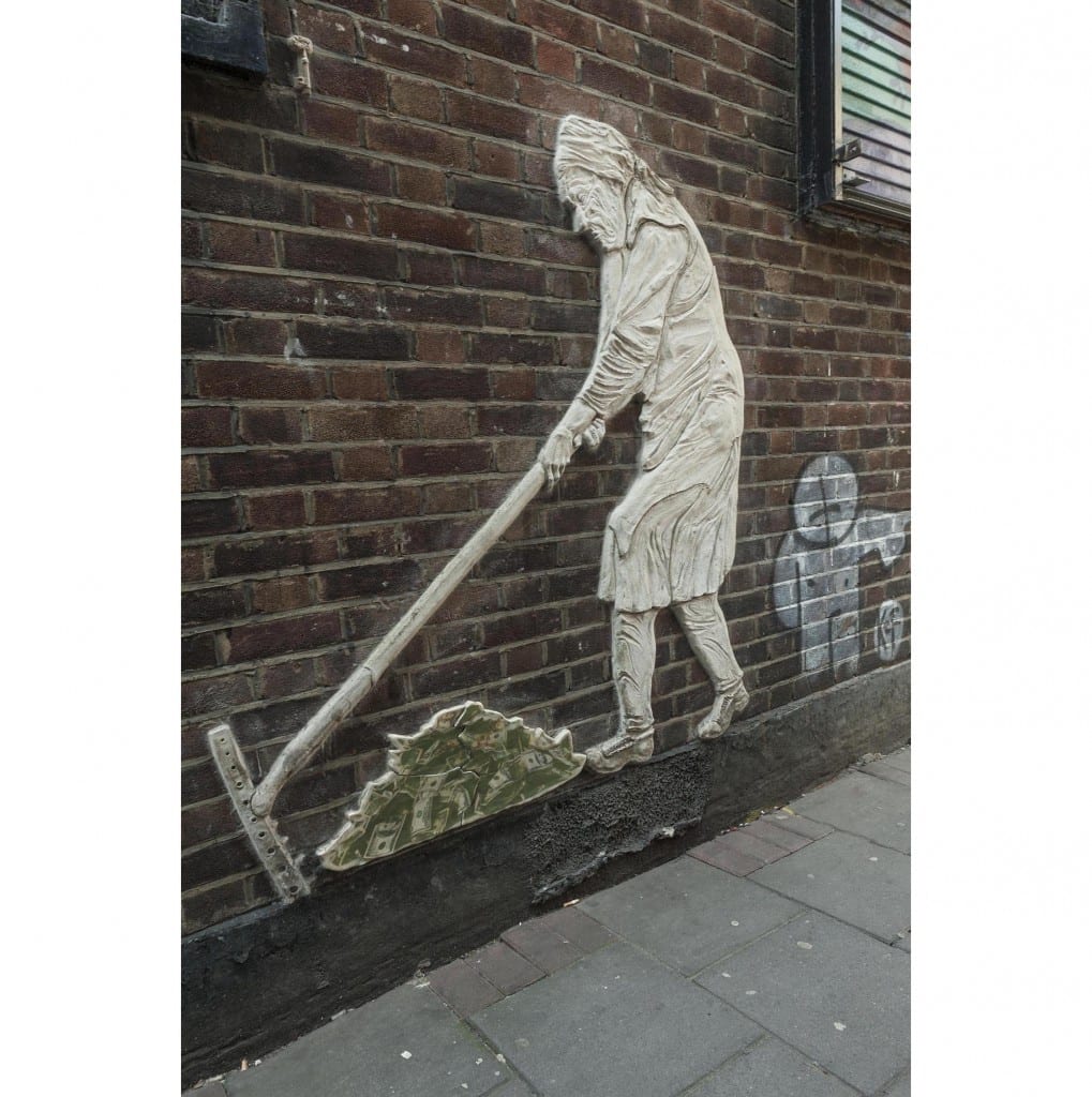 Survey of London - Whitechapel Volume Whitechurch Passage, Whitechapel. Wall art of old woman raking up money, by artist "China Girl."