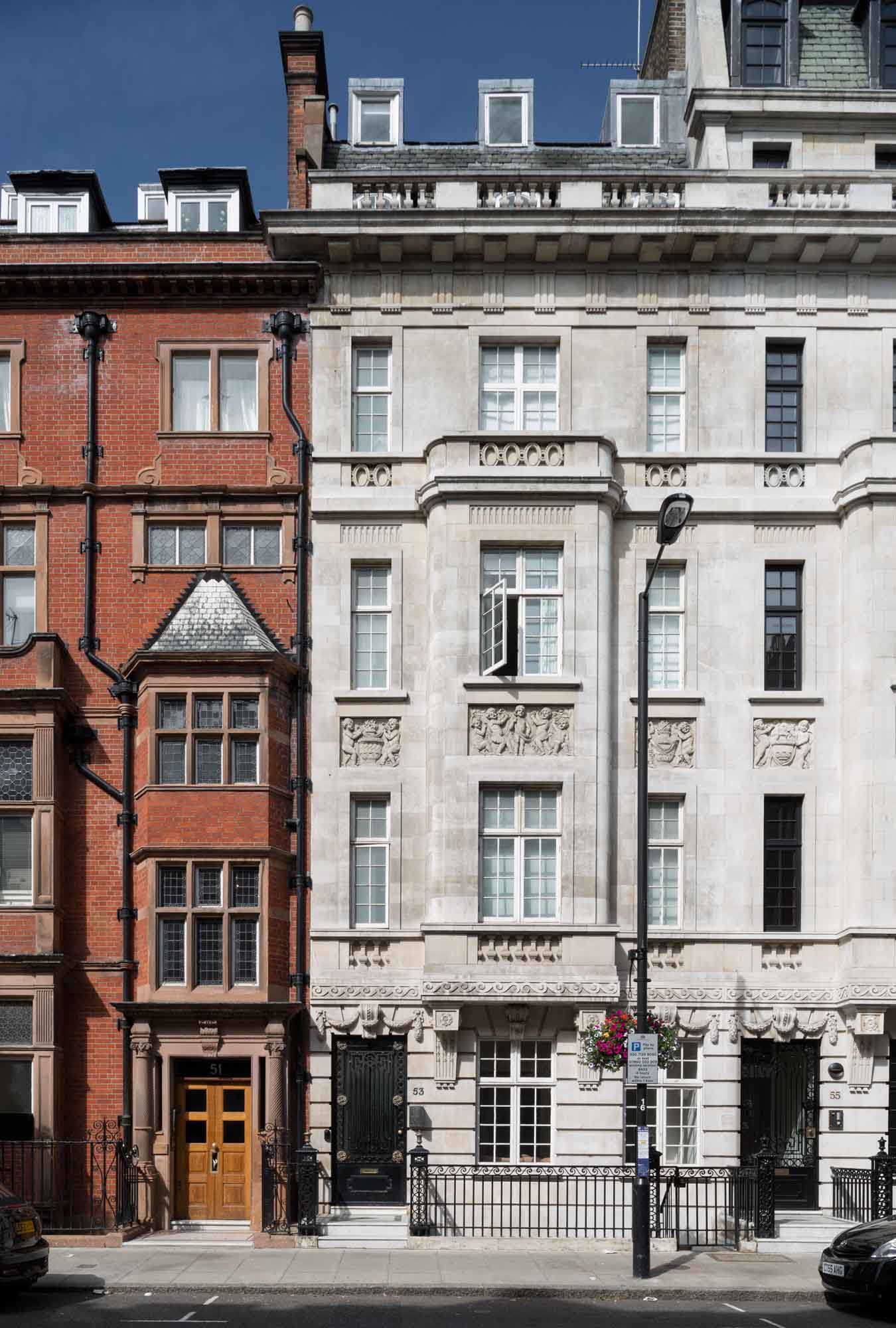 Nos 51 (left) and 53 Harley Street. No. 51was built in 1894 to designs by F. M. Elgood for the surgeon William Bruce Clarke on the site of the Turk's Head pub. No. 53 was designed by Wills & Kaula and completed in 1914-15 as a home and practice for the surgeon and urologist Frank Seymour Kidd.