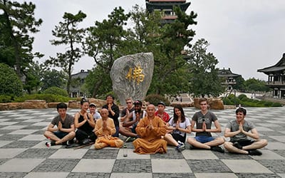 students and monks during temple visit
